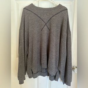 Women’s drop shoulder top. Cute detailing navy blue stitching, oversized